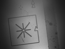 UV microscope image of MEMS Device Contamination at 248 nm