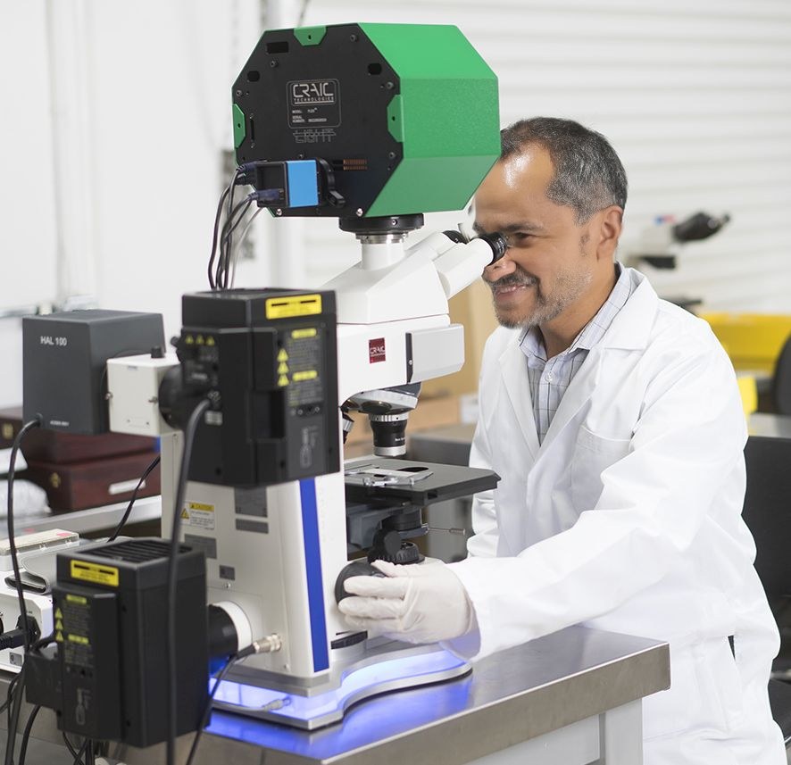 Researcher using the 508PV microscope spectrophotometer