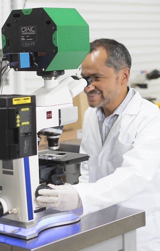 Researcher using the 508PV microscope spectrophotometer